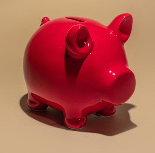 Photograph of a red piggy bank