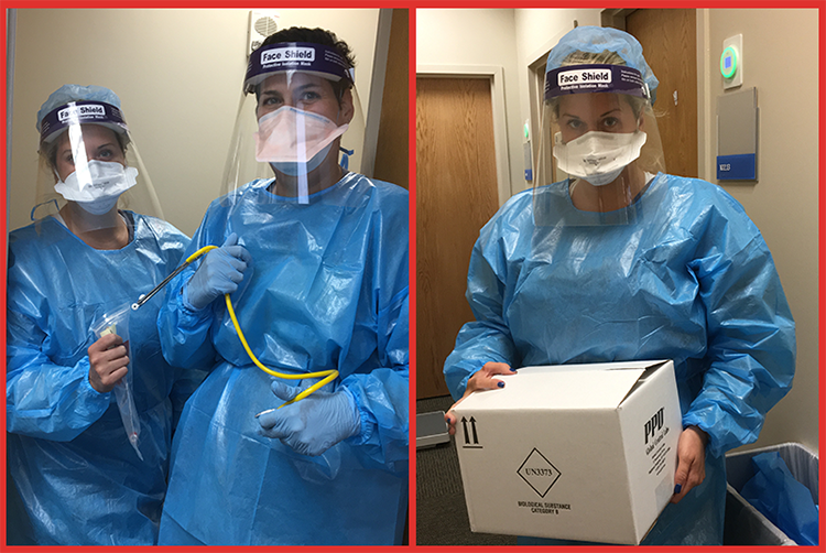 Image of two women in blue biohazard gowns with facemask